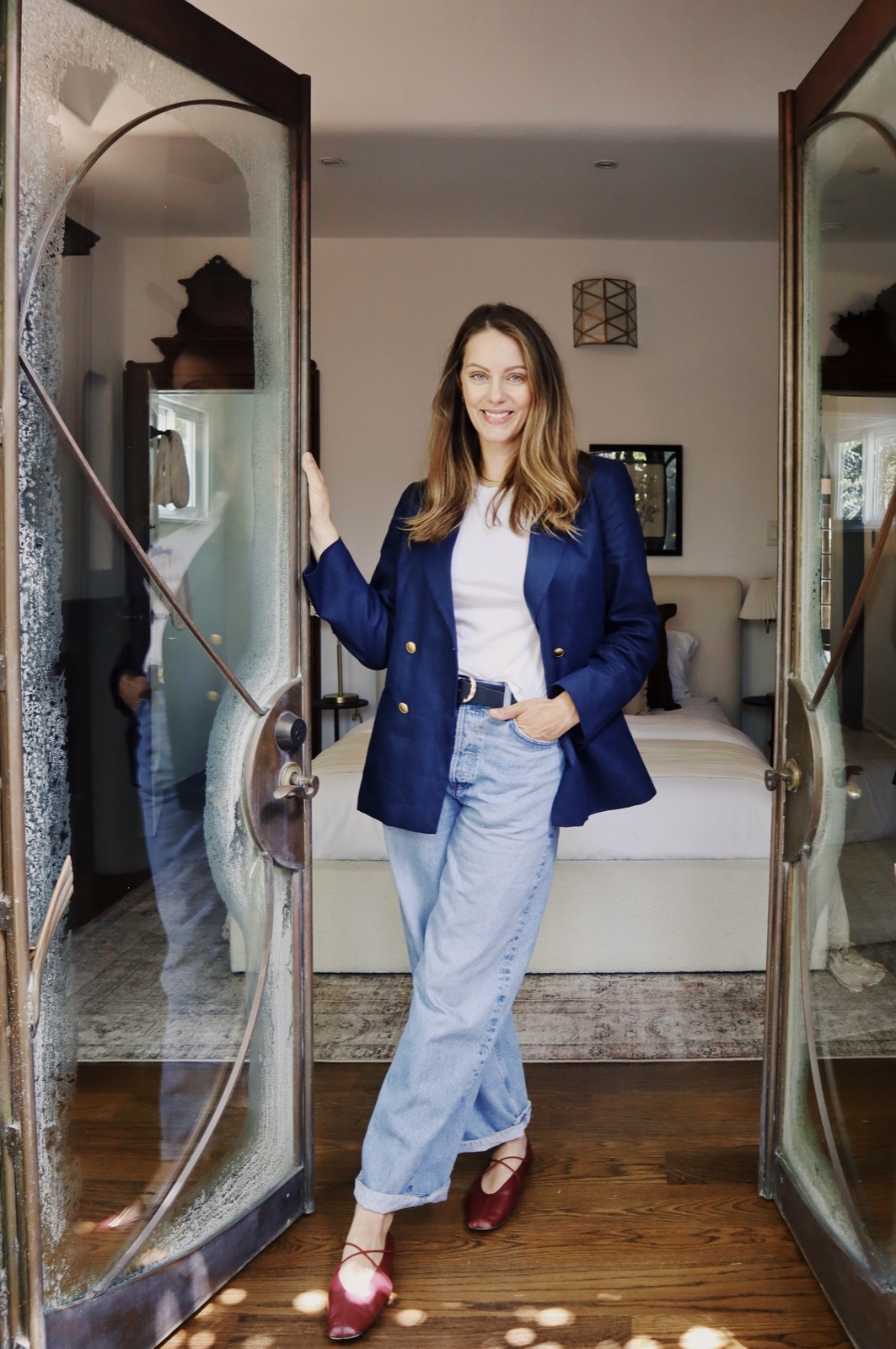 Julia Zonshine standing in the doorway of a Los Angeles home