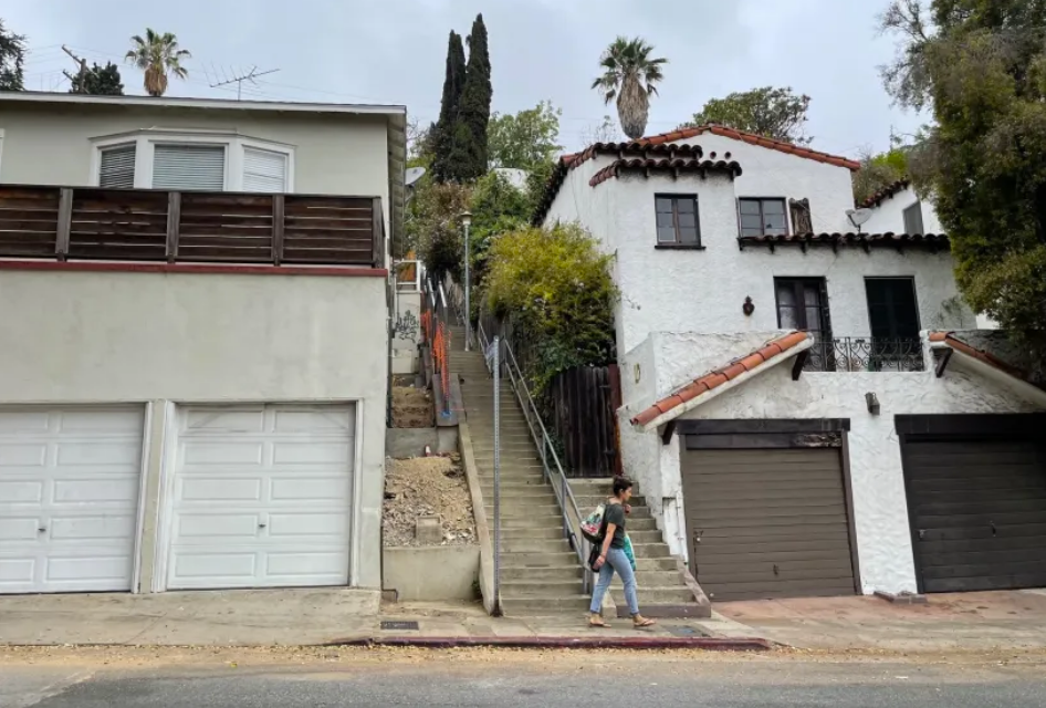 A public stairway climbing between hillside homes in Silver Lake