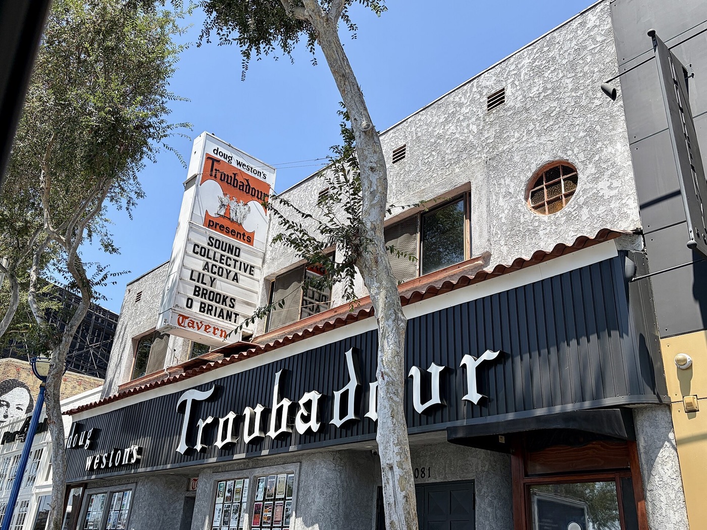 The Troubadour’s white stucco exterior and marquee in West Hollywood