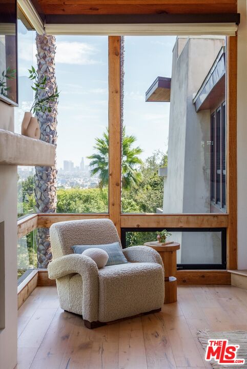 Los Angeles skyline view through floor-to-ceiling corner glass at 2165 Ponet Drive