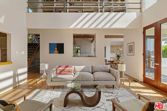 Double-height modernist living room at 2276 Moreno Drive