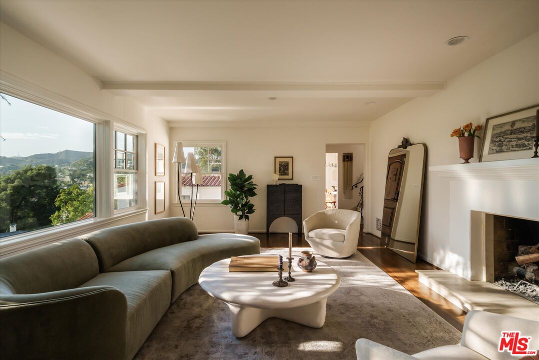 Living room view over Silver Lake hills at 2560 Micheltorena Street