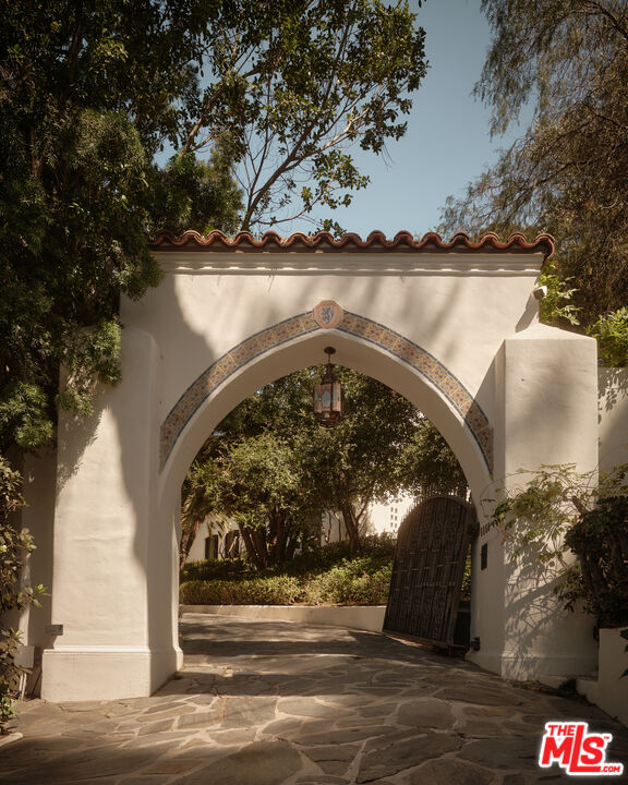 Tiled arched entry gate at 2666 Aberdeen Avenue
