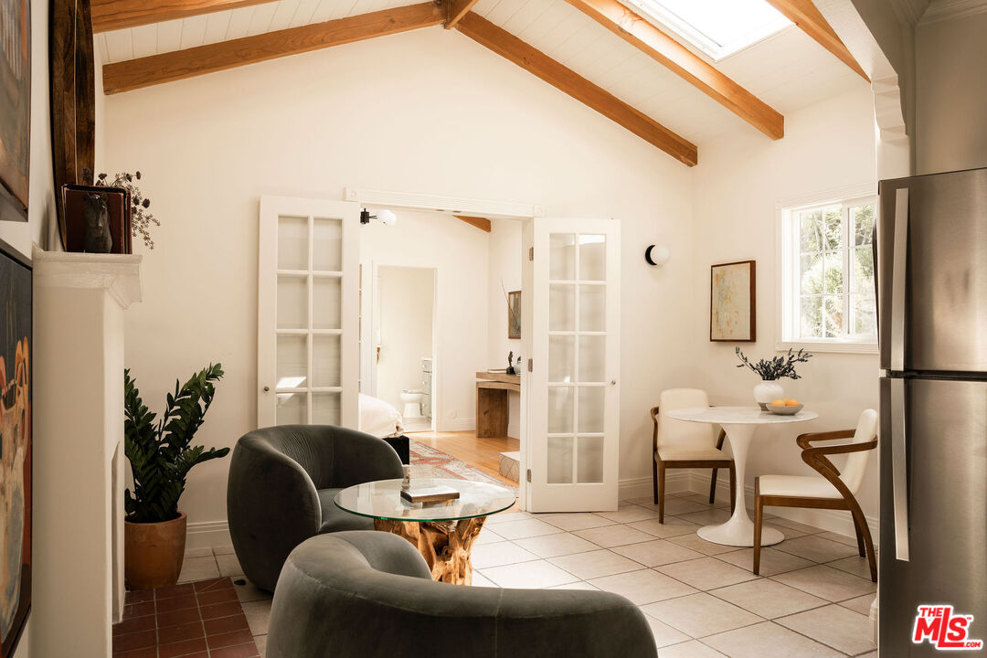 Vaulted and skylit guest house living space at 3895 Fredonia Drive