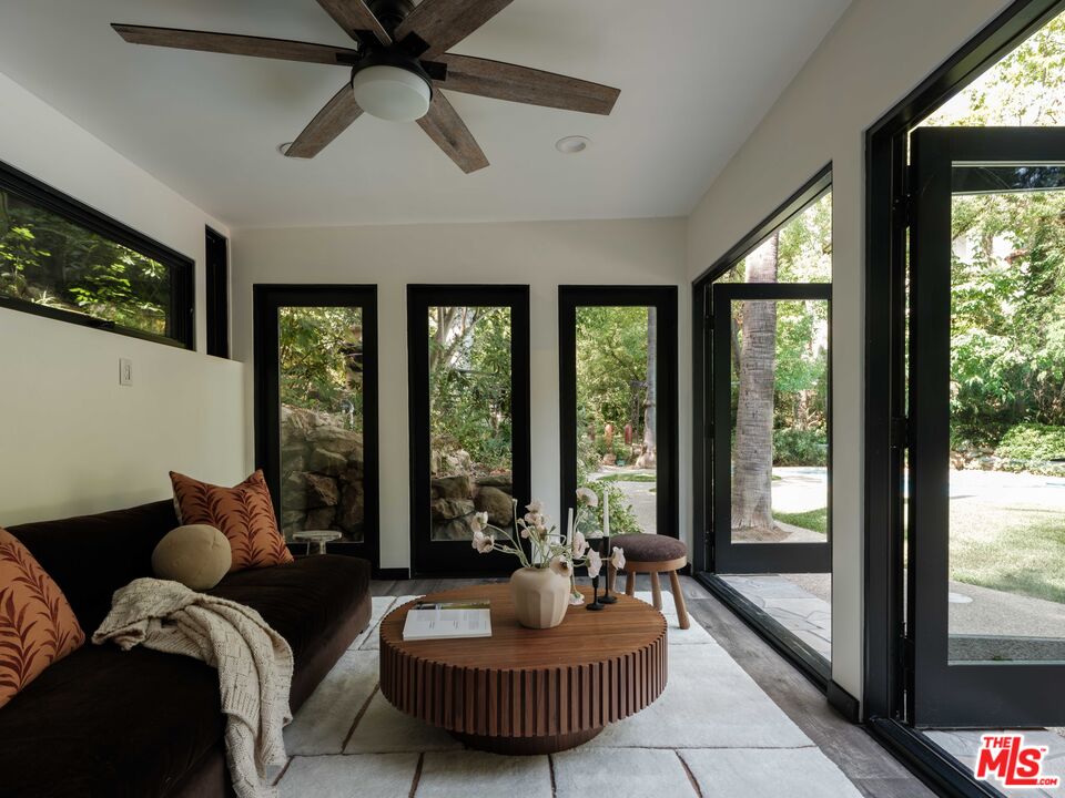 Independent guest living space opening to the landscaped grounds at 954 Hillside Terrace